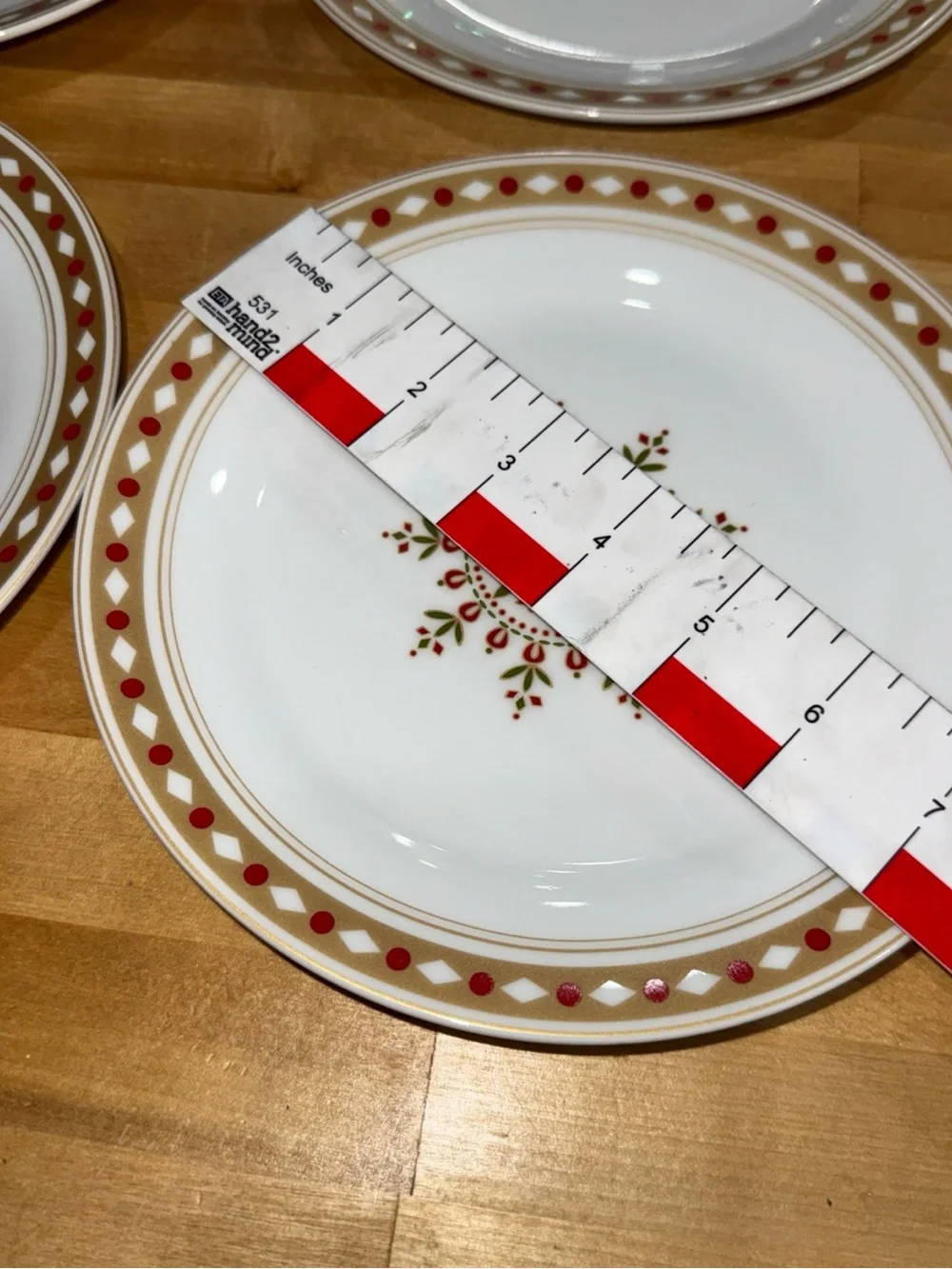 Pier 1 White Dinner Plates with Red and Gold Starburst Motif